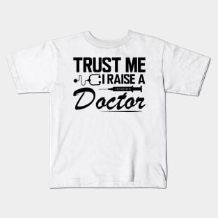Trust me I raise a doctor Kids T-Shirt